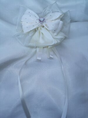 Pearl Glow Heart Bow Clip