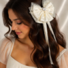 Pearl Glow Heart Bow Clip