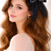 Elegant bow and soft beauty Elegant Pearl-Embellished Satin Bow - 1 Pair